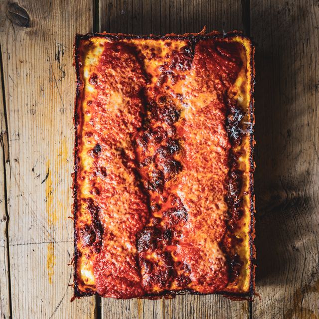 A Detroit pizza from above, caramelised cheese edge on all four sides